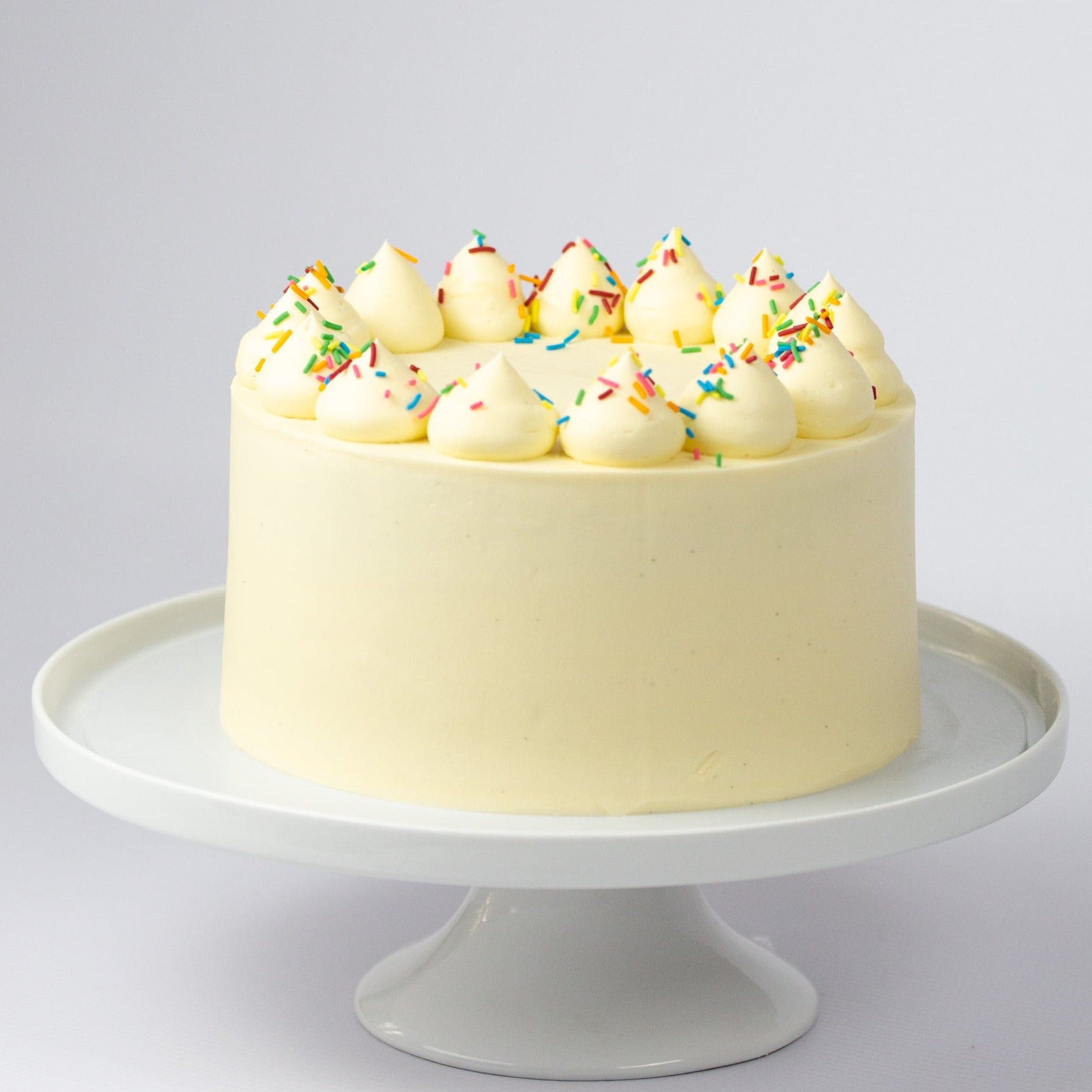 Eggless Vanilla Sponge Cake Recipe - Eggless Basic Vanilla Cake (no eggs no  butter) - Blend with Spices